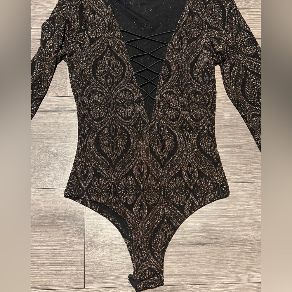 Long sleeve black and gold bodysuit Size S